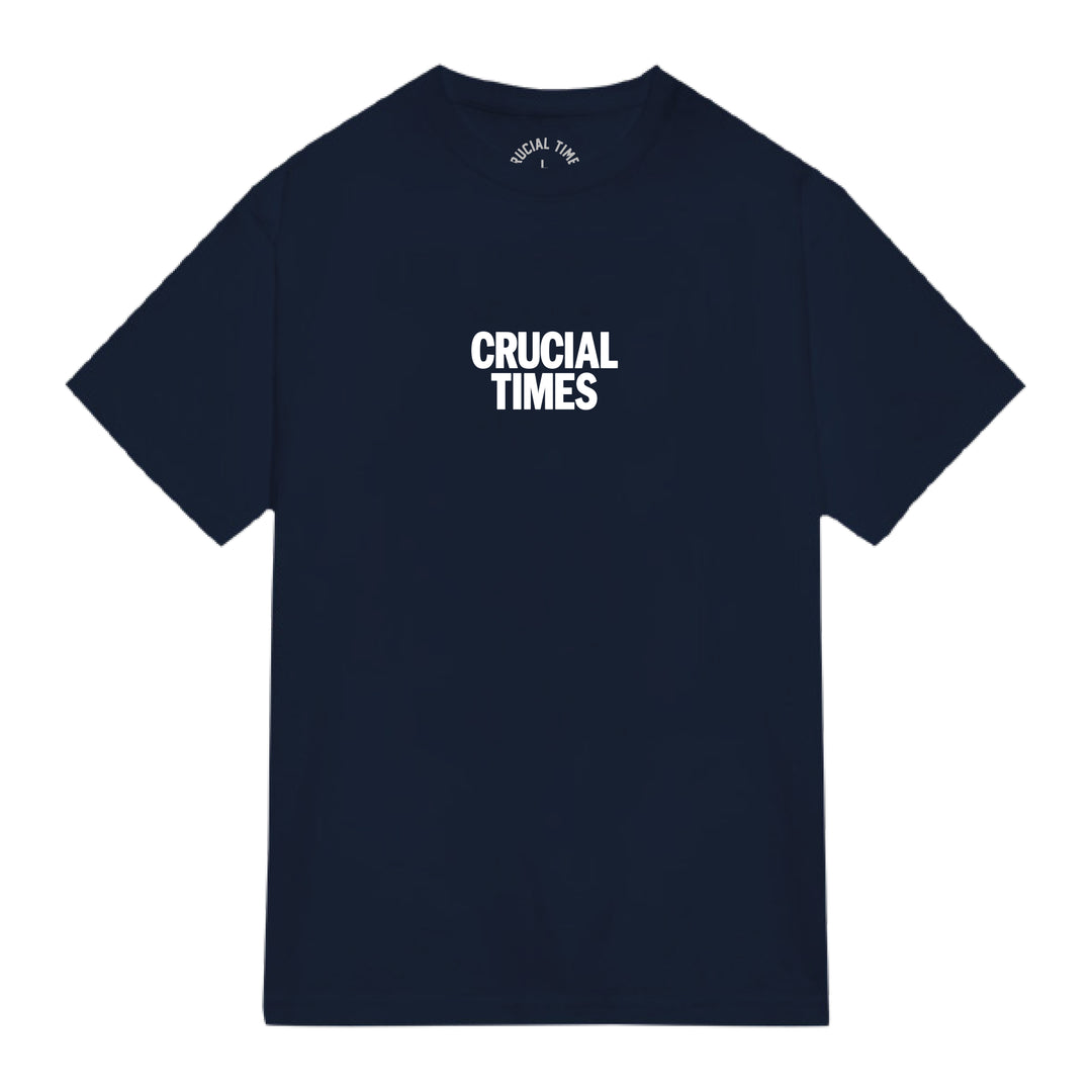 A plain navy blue Crucial Times t-shirt featuring "CRUCIAL TIMES" boldly printed in white across the chest—ideal for fans of quality printed apparel.