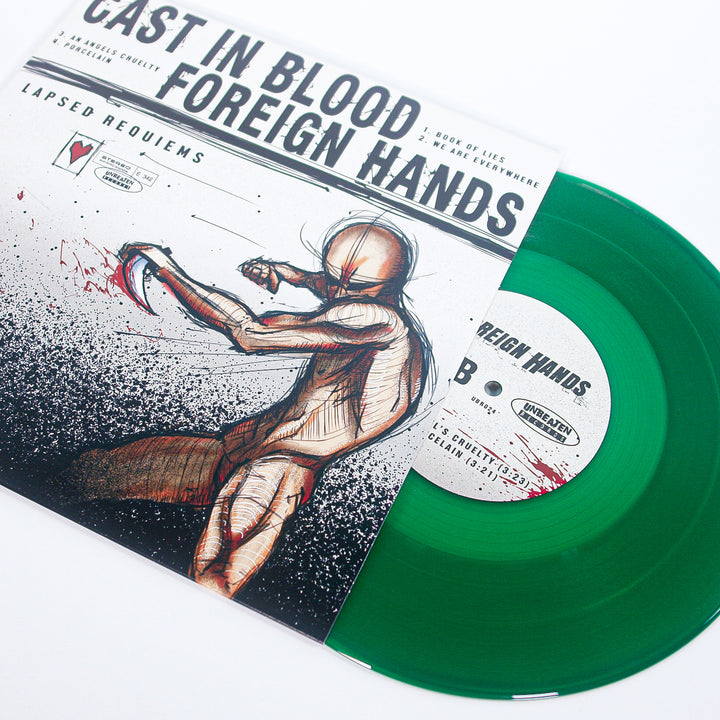 Vinyl record with green disc and illustrated cover featuring a person in a helmet and uniform.