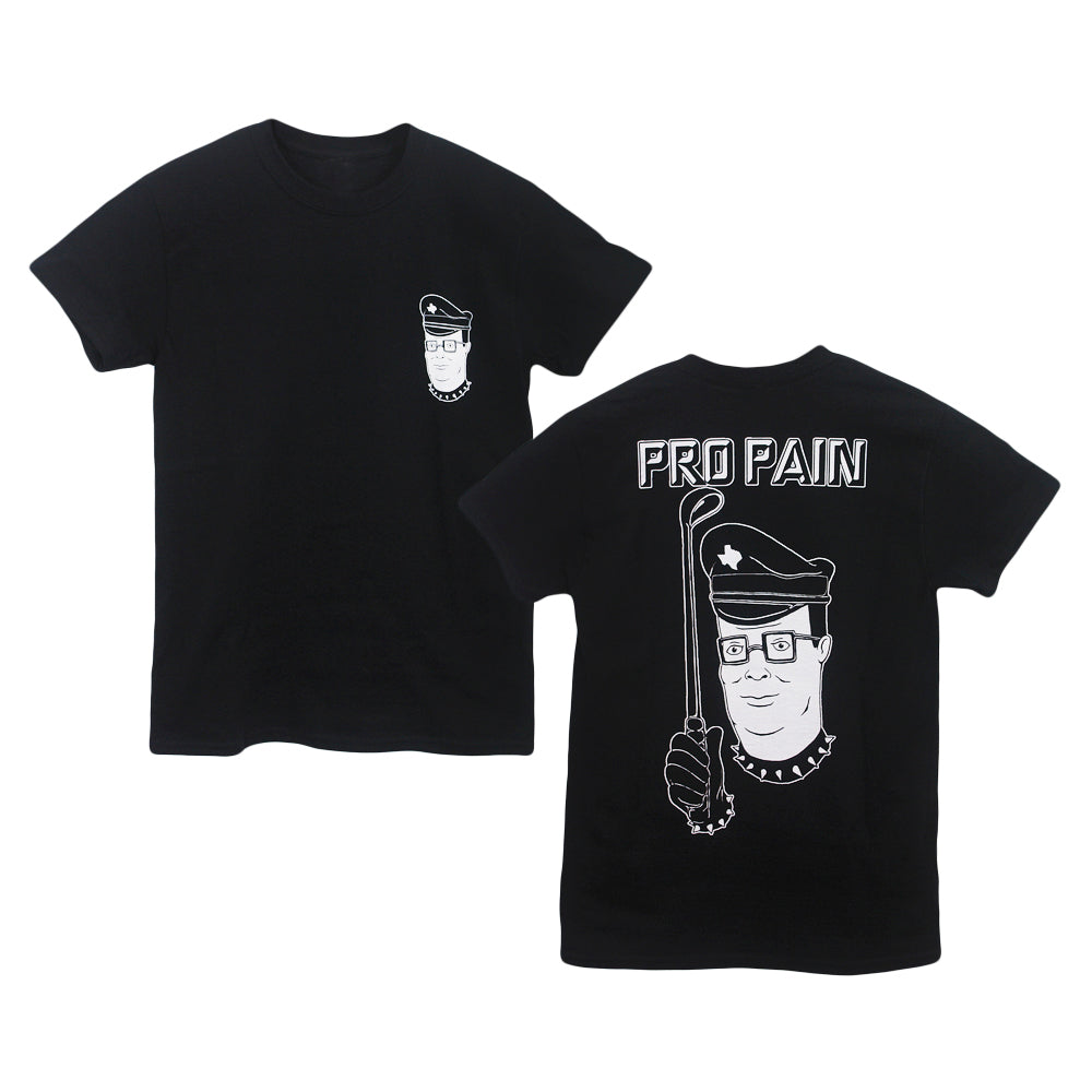 Castle Jackal black Comfort Colors tee featuring a small face-in-a-hat graphic on the front left chest and a large “PRO PAIN” back print with the same face holding a crowbar. Available for pre-order.