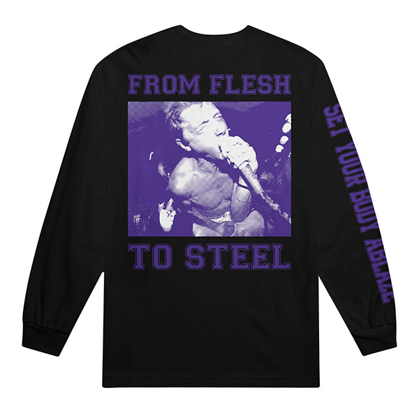 A black Shai Hulud Comfort Colors long-sleeve with a purple-tinted photo of someone screaming into a mic, FROM FLESH TO STEEL on the back, and SET YOUR BODY ABLAZE printed down the right sleeve.