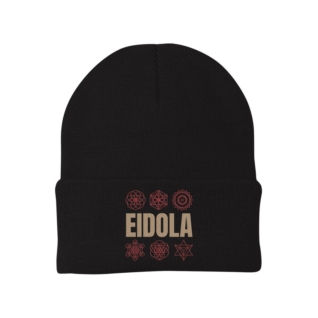 A black Eidola beanie with bold beige "EIDOLA" lettering, framed by six red geometric icons stacked in two rows above and below the text.