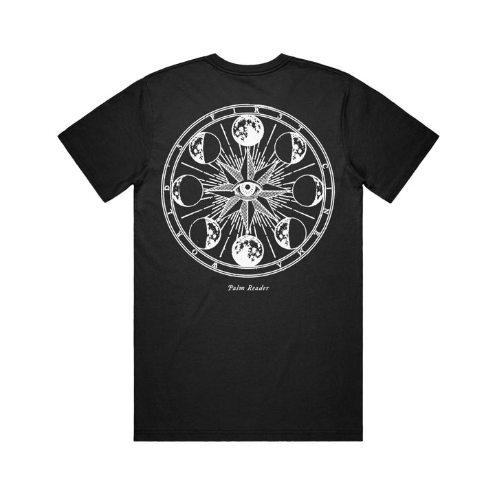 Black Comfort Colors t-shirt by World’s First Cinema featuring a bold white eye and moon phases graphic on the back, with “Palm Reader” below. Ideal for fans of unique custom apparel.
