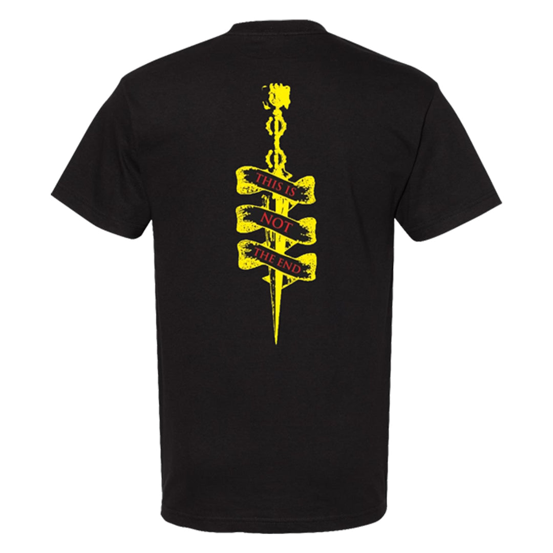 The Cable Car Theory Comfort Colors 1717 black tee features a yellow sword graphic on the back, wrapped with a red and yellow banner reading “THIS IS NOT THE END.” This garment-dyed shirt delivers standout style and comfort.