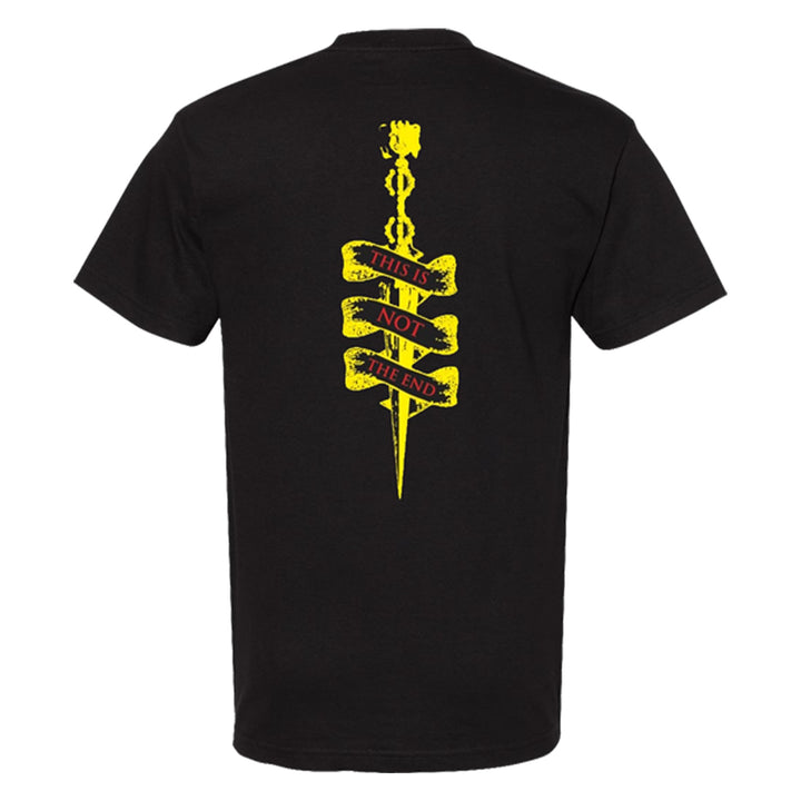 The Cable Car Theory Comfort Colors 1717 black tee features a yellow sword graphic on the back, wrapped with a red and yellow banner reading “THIS IS NOT THE END.” This garment-dyed shirt delivers standout style and comfort.