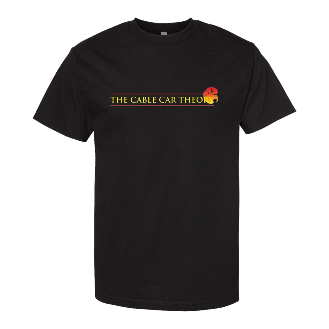 The Cable Car Theory Comfort Colors 1717 black garment-dyed tee with yellow "THE CABLE CAR THEORY" text and a red and yellow cable car graphic on the right, centered on the chest.
