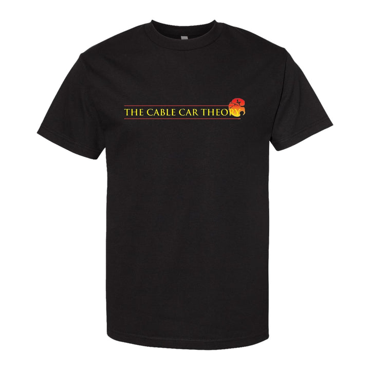 The Cable Car Theory Comfort Colors 1717 black garment-dyed tee with yellow "THE CABLE CAR THEORY" text and a red and yellow cable car graphic on the right, centered on the chest.