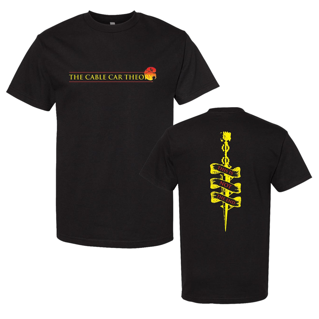 The Cable Car Theory black garment-dyed tee features "THE CABLE CAR THEO" text and a red graphic on the front, with a yellow bones-on-sword graphic and "THIS IS NOT THE END" on the back. Made from premium Comfort Colors 1717 for comfort.