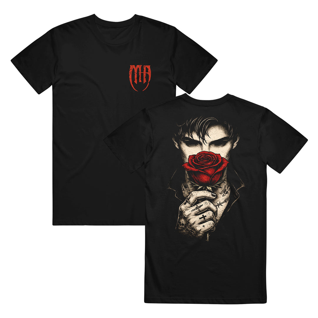 Melrose Avenue's Black Rose T-Shirt features a front left chest MIA logo in red and, on the back, an illustration of a brooding man with tattoos holding a red rose—a bold standout piece for unique style.