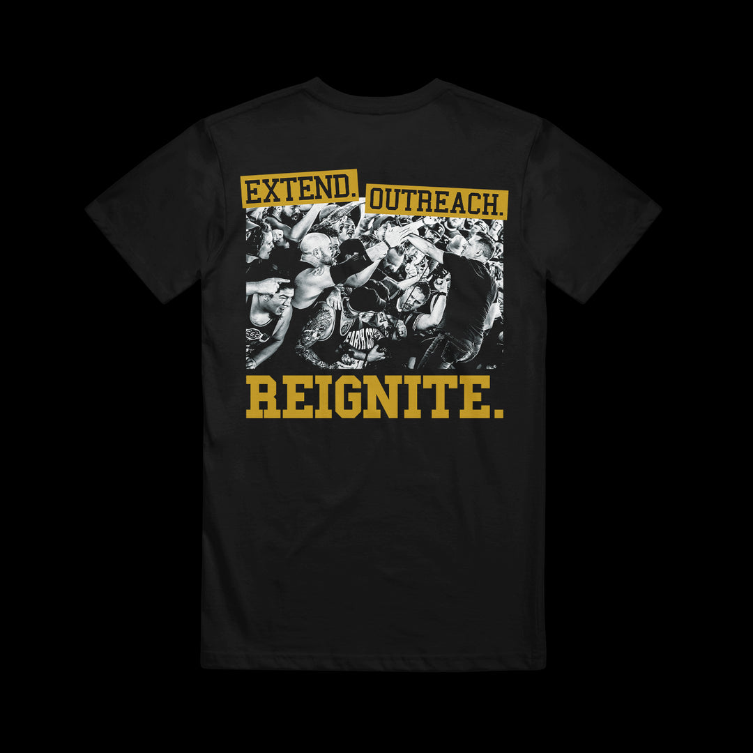 A black Shai Hulud Comfort Colors T-shirt featuring a black-and-white concert crowd photo on the back, bold yellow text “EXTEND. OUTREACH.” at the top and “REIGNITE.” at the bottom—ideal for fans of unique printed tees.