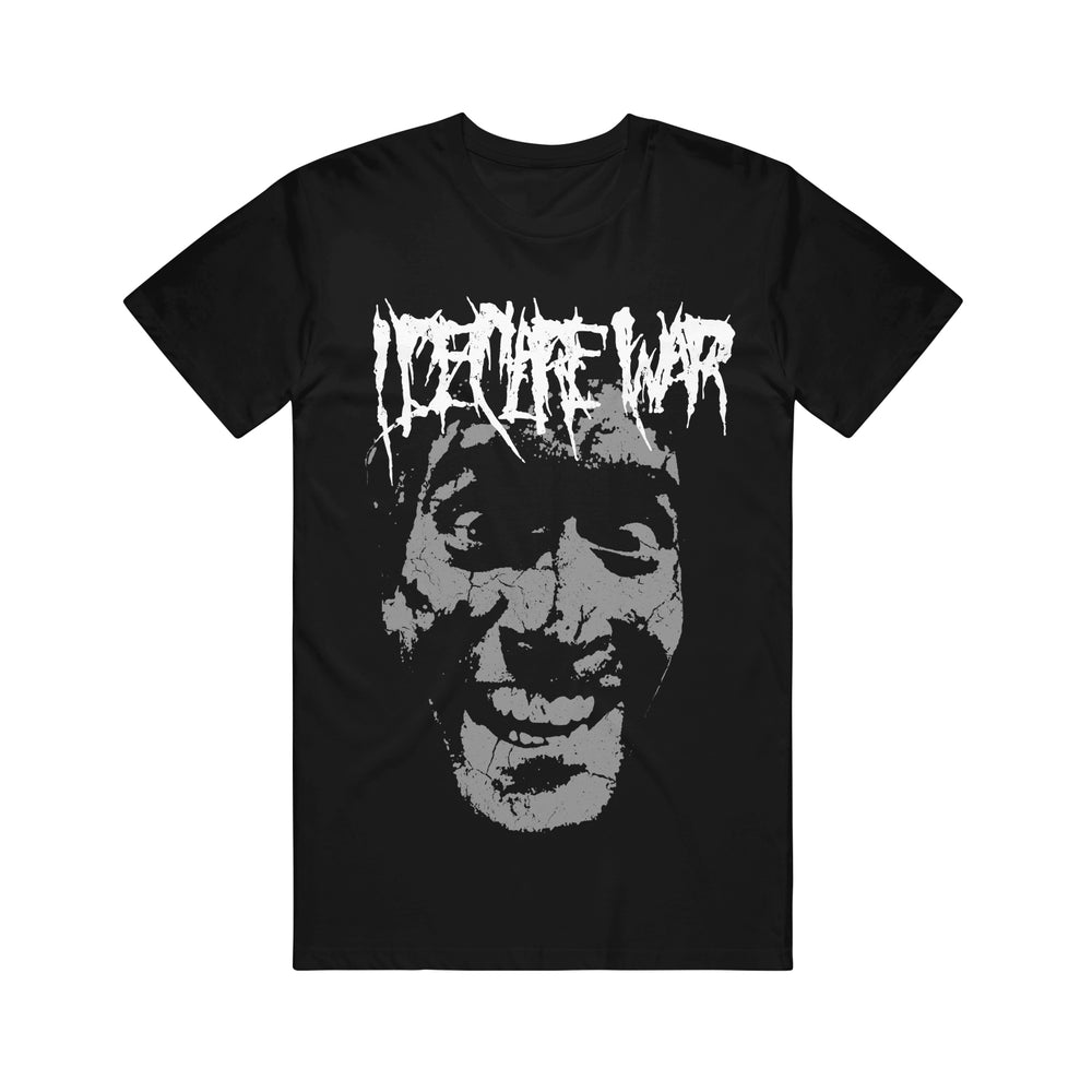 Black Gildan t-shirt by I Declare War featuring a large, distressed grayscale smiling face with exaggerated features. "IDENTITY WAR" is printed above in a jagged, horror-themed font. Bold, statement-making design.
