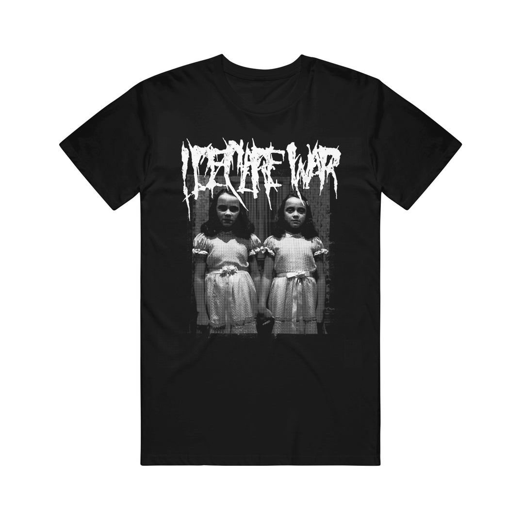Black Gildan t-shirt by I Declare War featuring a distorted white LORNA WAR logo above a black-and-white image of two young girls in matching dresses, standing side by side with serious expressions.