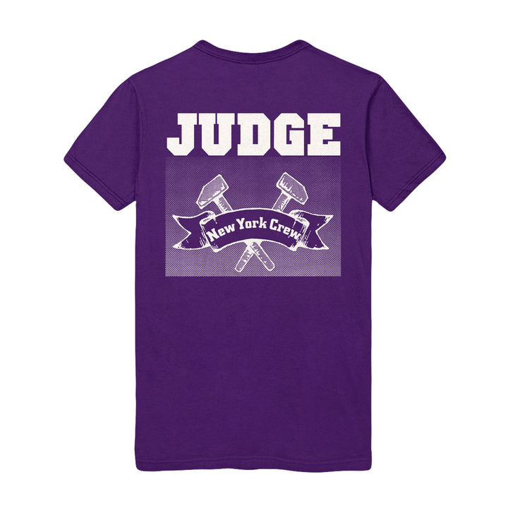 Judge purple Gildan t-shirt featuring “JUDGE” in bold white above a “New York Crew” banner and crossed gavels on the back—ideal for fans of printed apparel.