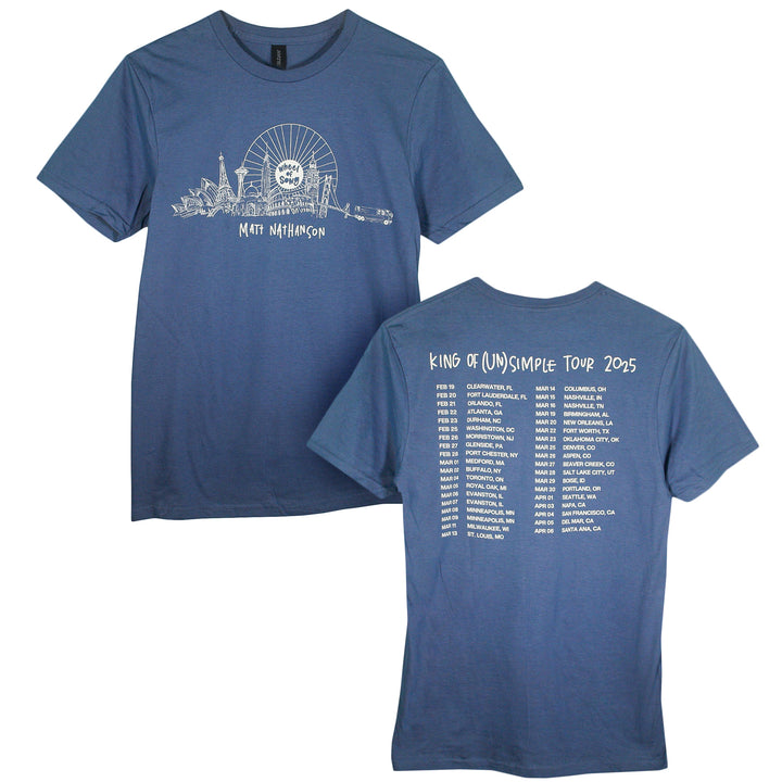 Blue Gildan Softstyle T-Shirt with a ferris wheel, city skyline, and “Matt Nathanson” on the front. Made from soft ring-spun cotton with a modern fit. Back lists 2025 “King of (UN)Simple Tour” stops in white text.