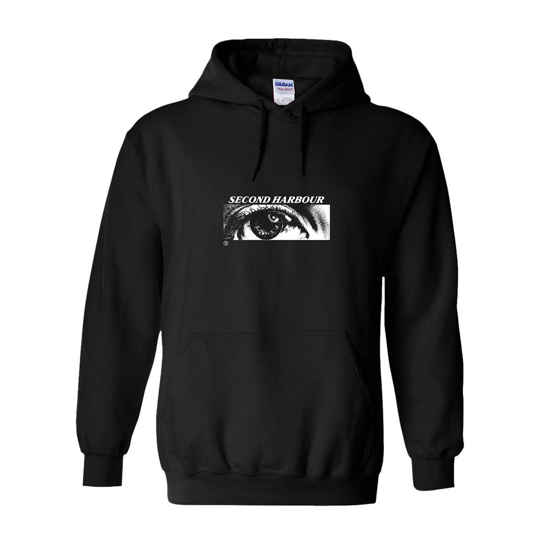 Black pullover hoodie by Second Harbour with a white rectangular eye graphic and "SECOND HARBOUR" on the chest, plus front pocket and drawstring hood for classic style.