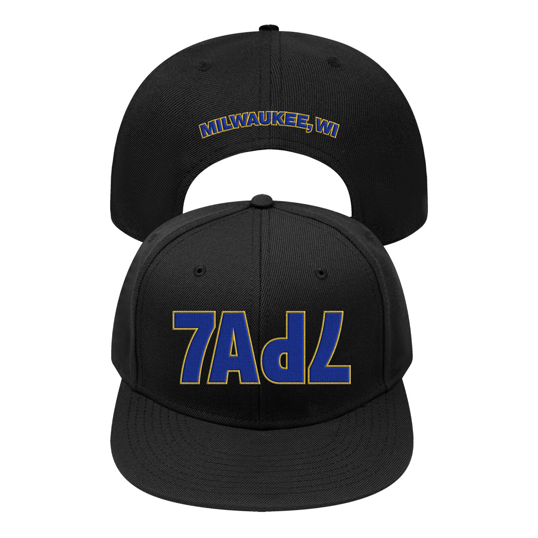 Structured black baseball cap with 3D puff embroidery of 7AdL in blue and gold on the front and MILWAUKEE, WI on the back.