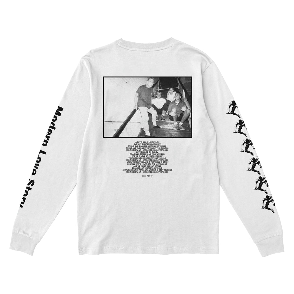 White Gildan heavy cotton long sleeve by Youth Of Today with a black-and-white photo of three people on the back, text underneath, Modern Love Story on the left sleeve, and repeated stencil-style figures on the right sleeve.