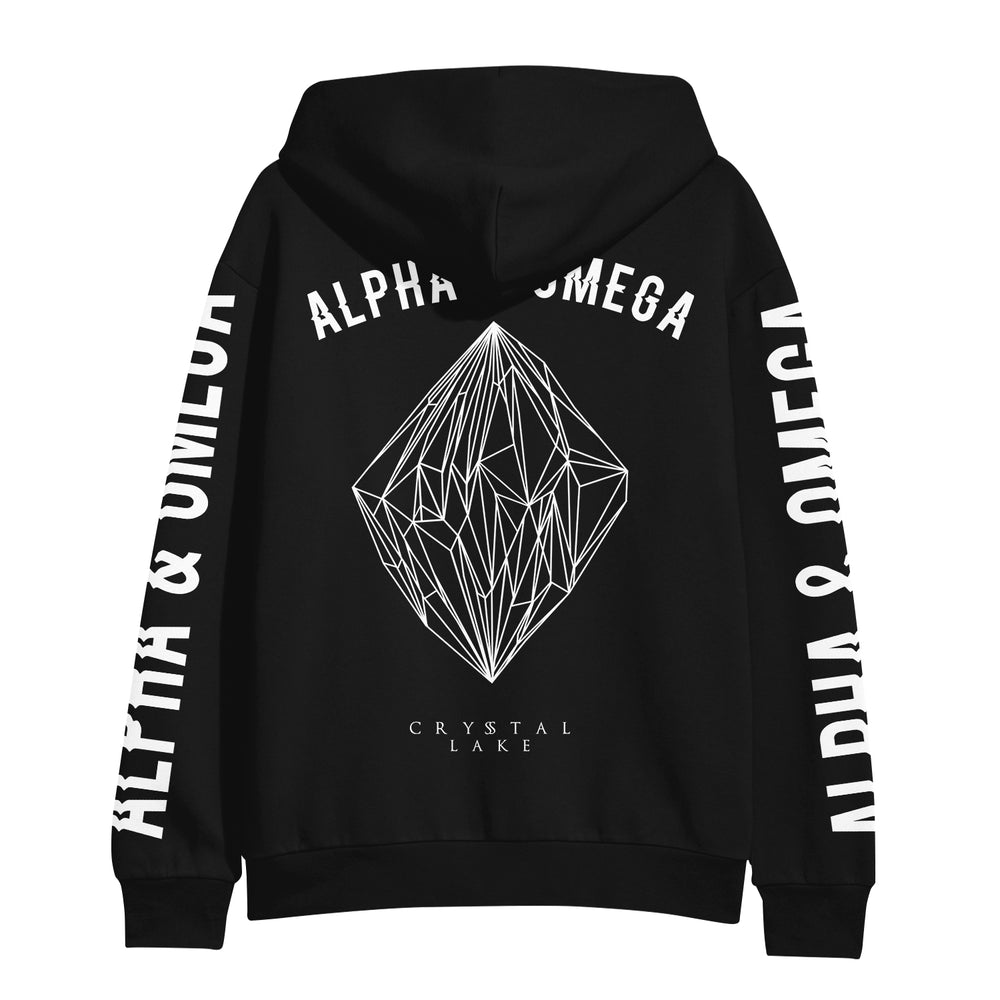 Black hoodie by Crystal Lake featuring a large geometric crystal design on the back, “ALPHA & OMEGA” above the graphic, “CRYSTAL LAKE” below, and “ALPHA & OMEGA” in bold down both sleeves.